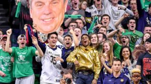 group of cheering students at sporting event