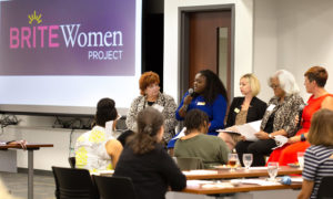 A panel speaks at the BRITE Women conference