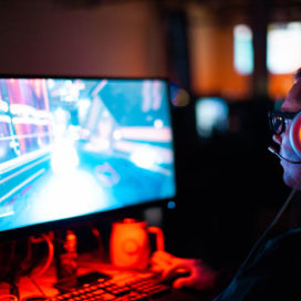 man playing video game