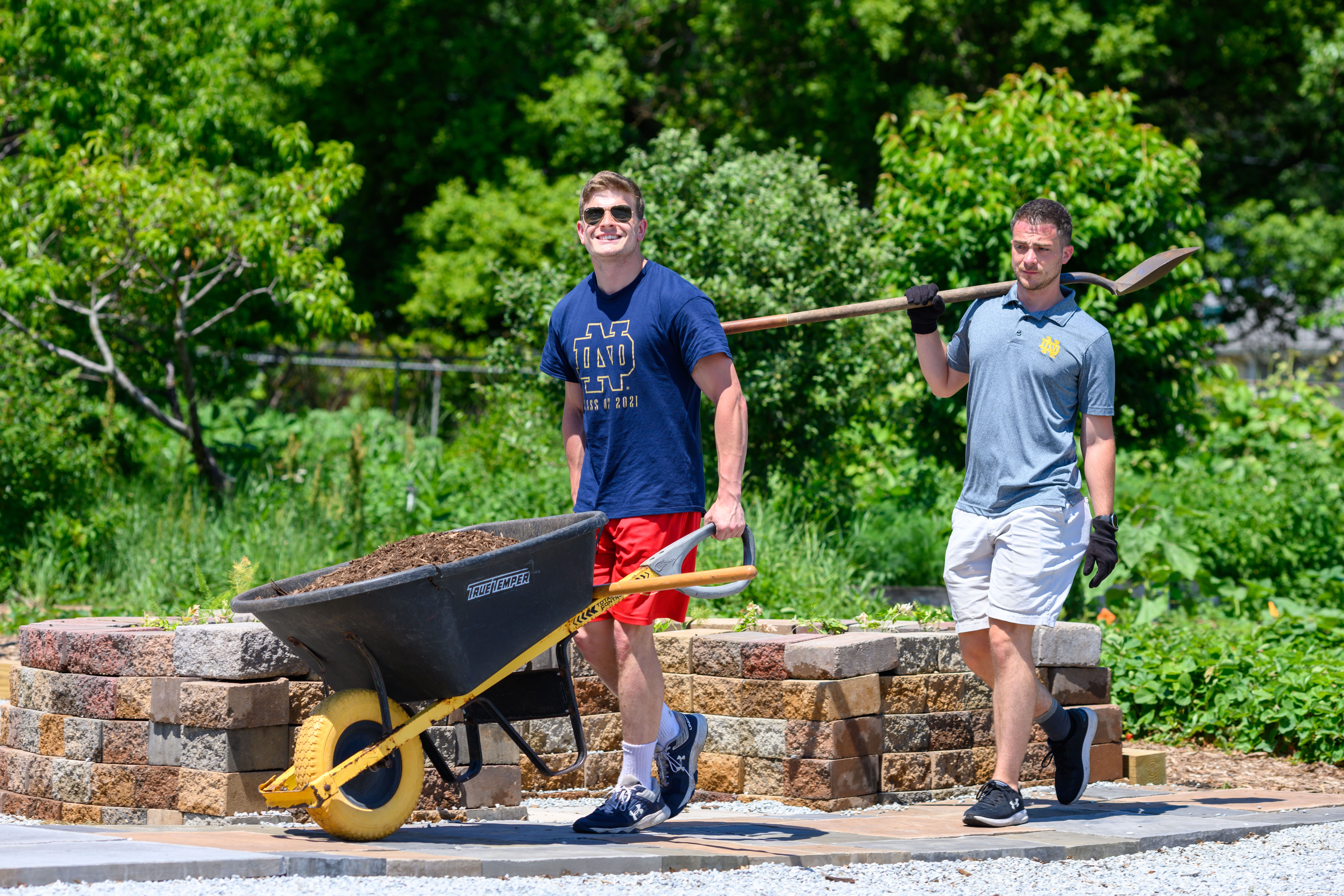June 16, 2021; Master of Science in Management (MSM) students do service work at Unity Gardens in South Bend. (Photo by Matt Cashore/University of Notre Dame)