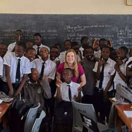 anna with students she's teaching in Uganda