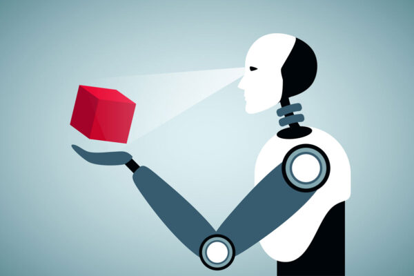 an AI robot examines a cube for quality control.